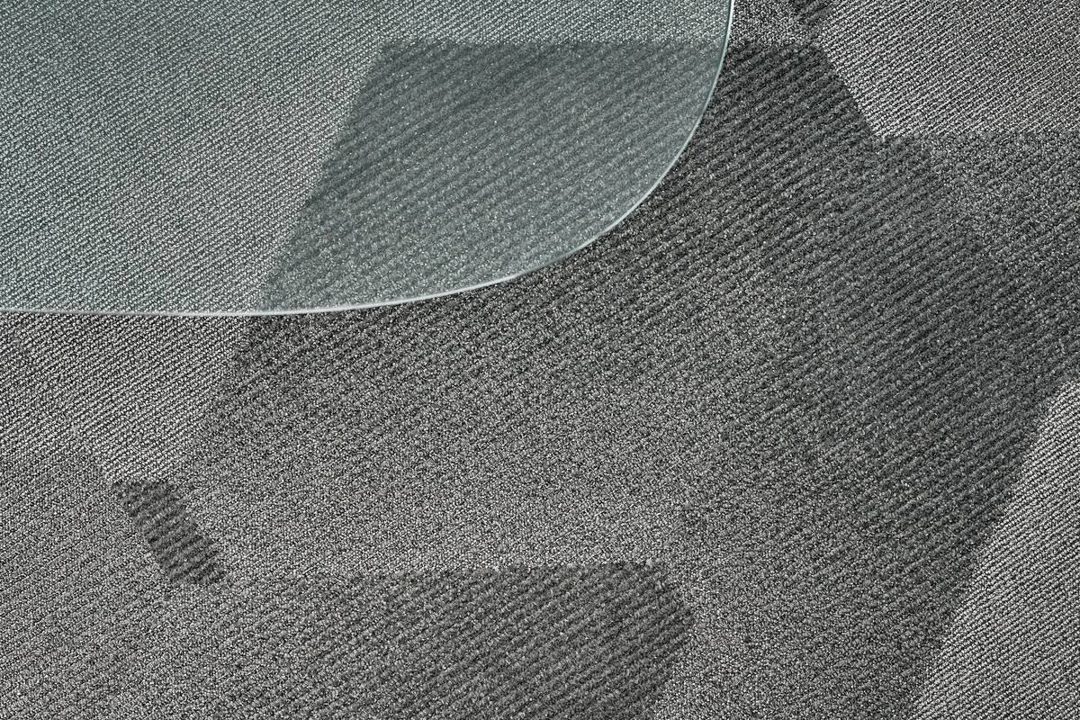 Cross-section showing proper carpet padding under carpet installation over wood subfloor