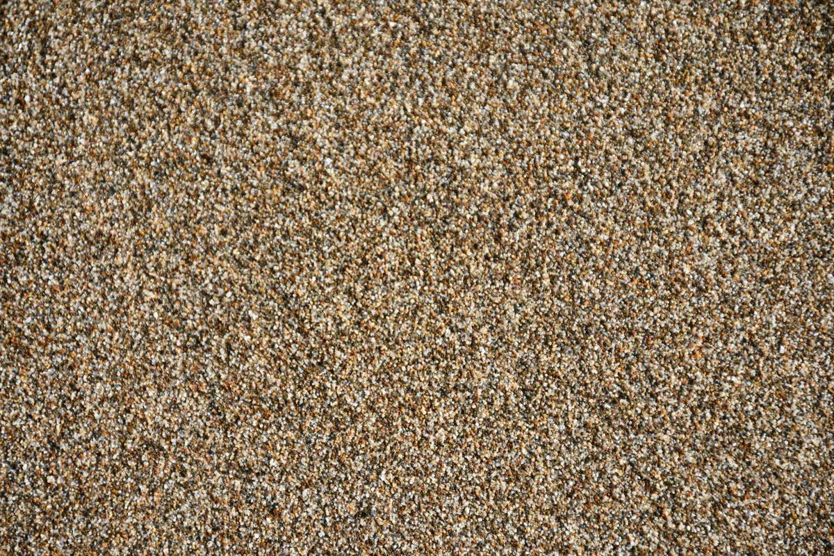 Commercial carpet and padding installation over concrete substrate with moisture barrier
